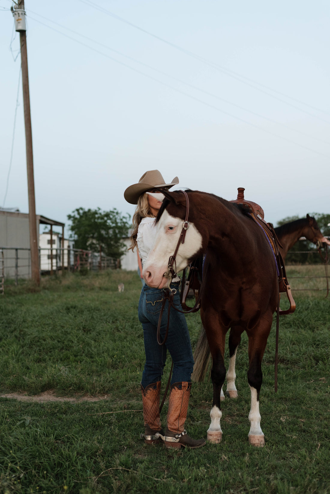 Kate Evans, 6x National Champion, with one of her beginner-safe paint horses at Highbrow Ranch in Caldwell, Texas