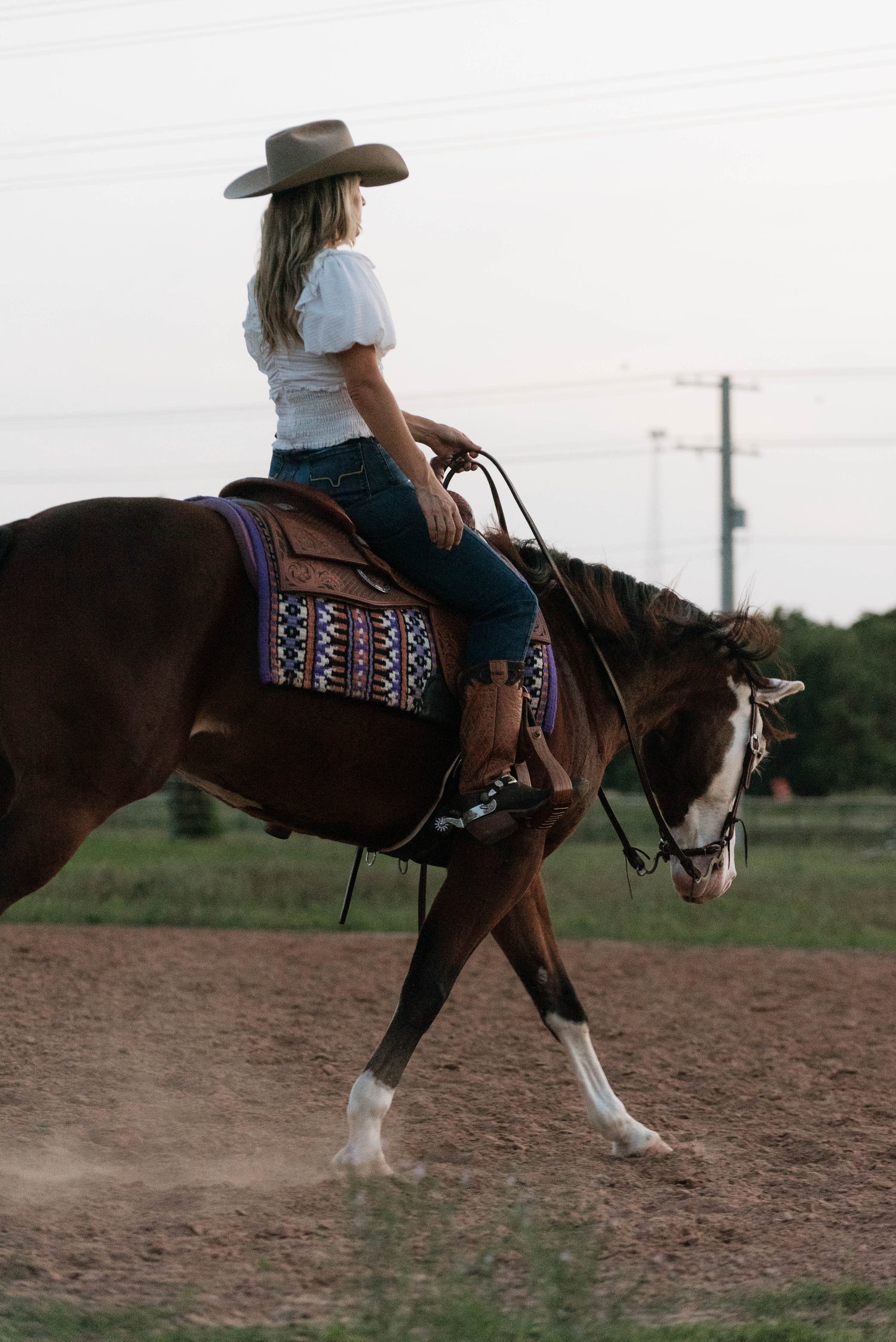 Adult beginner rider with a beginner-safe horse at Highbrow Ranch in Caldwell, Texas